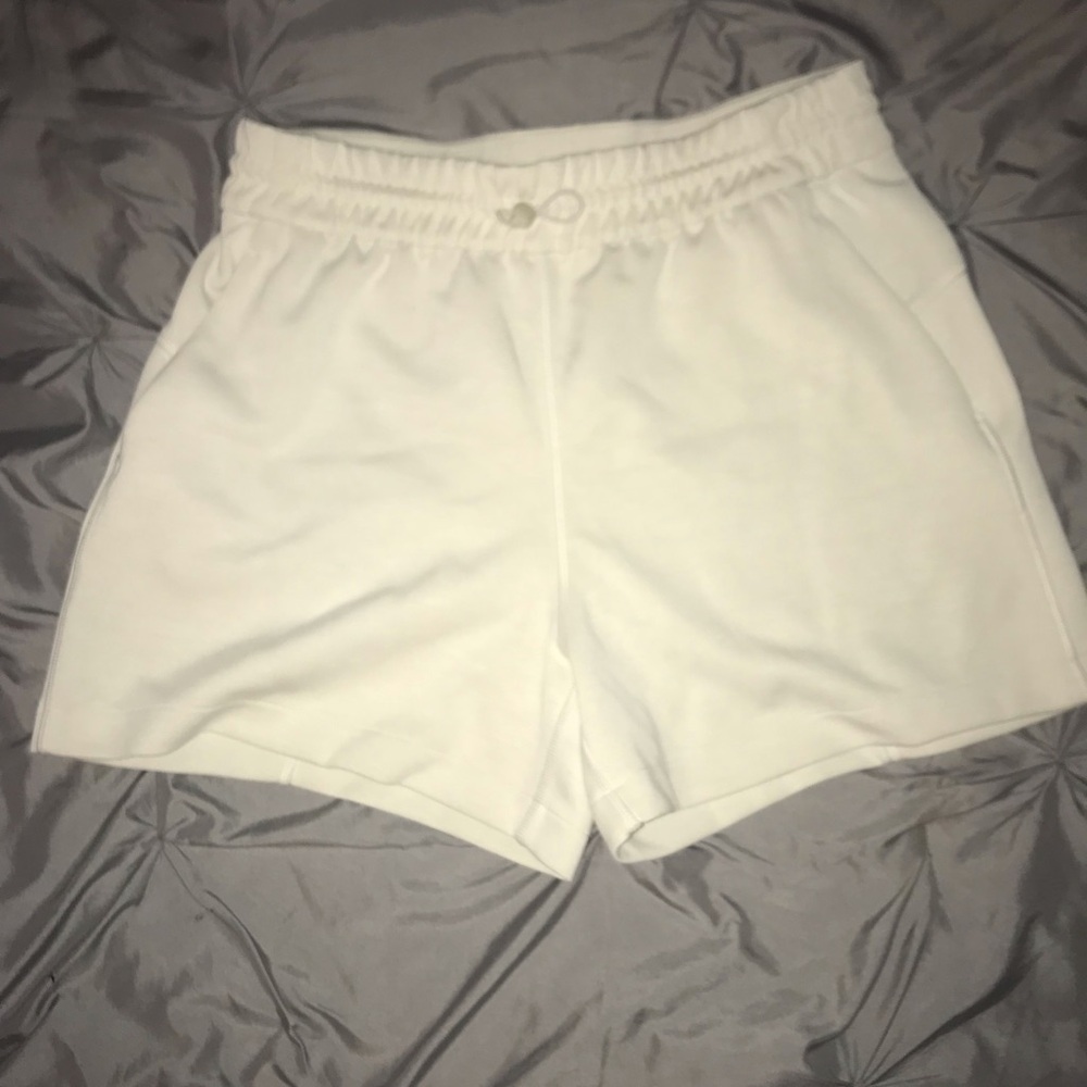 Lululemon Cream Athletic Shorts with Textured Fabric and Comfortable Fit